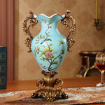 Vase décoratif en résine couleur bourgogne avec motifs floraux