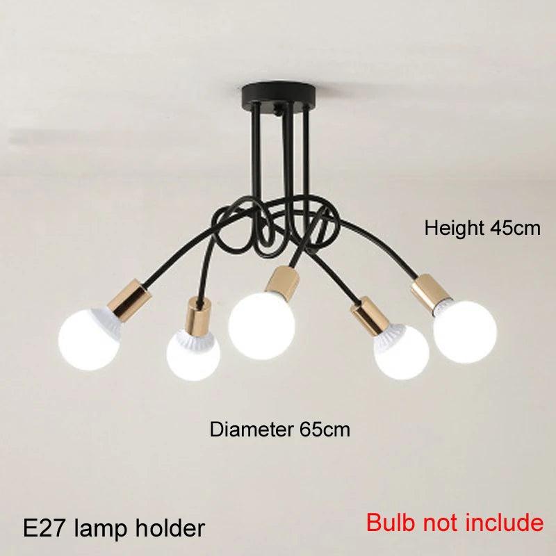 suspension lumineuse moderne noir doré ampoules blanches structure spirale fixation câbles métallique
