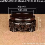 support bois ornements sculptés complexe artisanal marron foncé traditionnel décoration maison objet décoratif stand