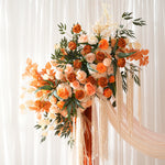 arche décorative boho chic fleurs artificielles orange feuilles vertes franges blanches extérieur mariage anniversaireévénement