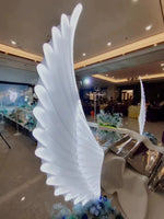 décoration mariage ailes lumineuses blanc nervures modernes pieds métal