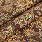 Élégant tissu marron aux motifs floraux et géométriques, dégageant une atmosphère paisible et raffinée.