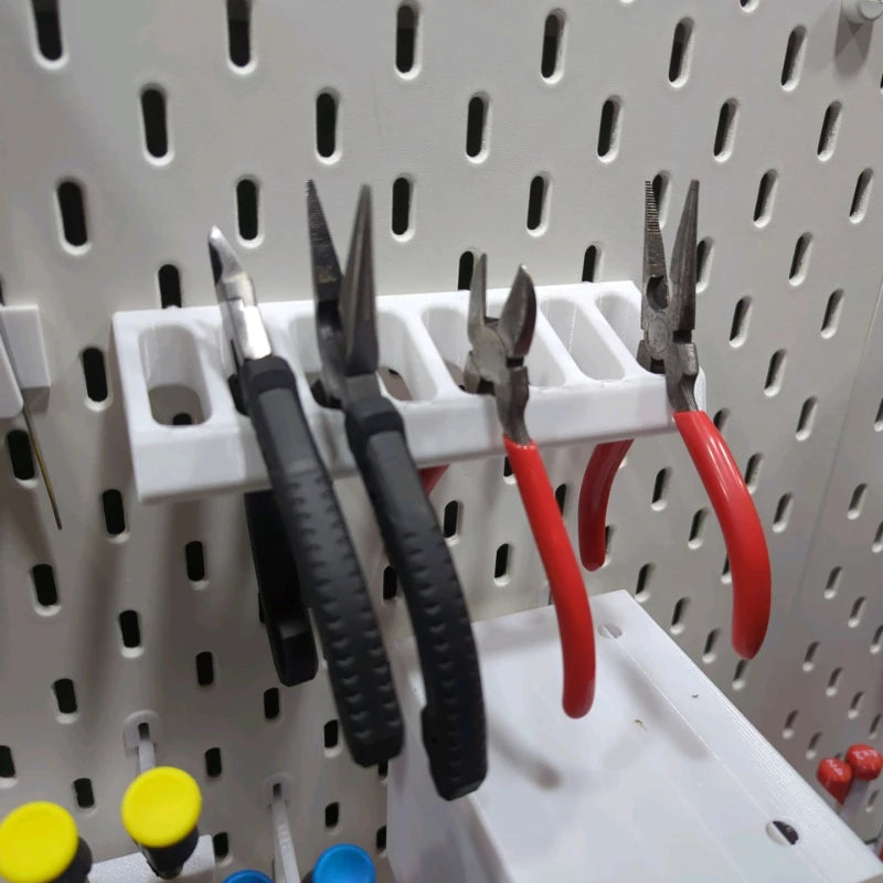 rangement pinces outil mur clips noir rouge bleu pratique industriel utilitaire