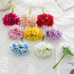 bouquet artificiel fleurs rouge rose jaune violet bleu blanc moderne intérieur décoration festive