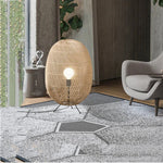 lampe sol moderne rattan tressé beige clair pieds noirs câble noir 11 15w led