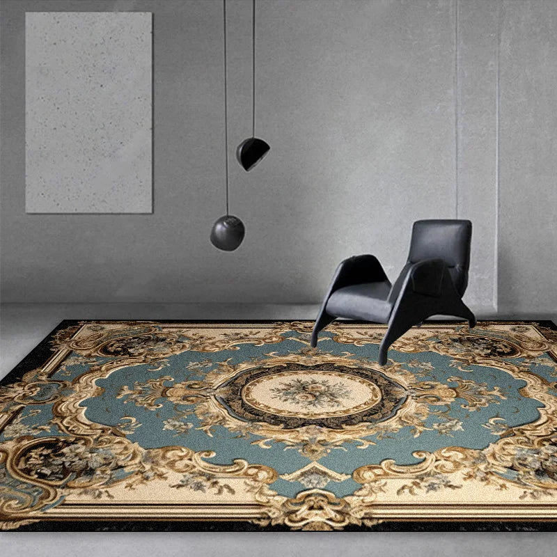 Deux fauteuils noirs modernes posés sur un tapis persan coloré dans un intérieur minimaliste aux murs gris.