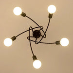 suspension lumineuse moderne minimaliste noir or blanc branches incurvées métal fixation ampoles led