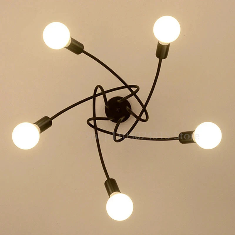 suspension lumineuse moderne minimaliste noir or blanc branches incurvées métal fixation ampoles led