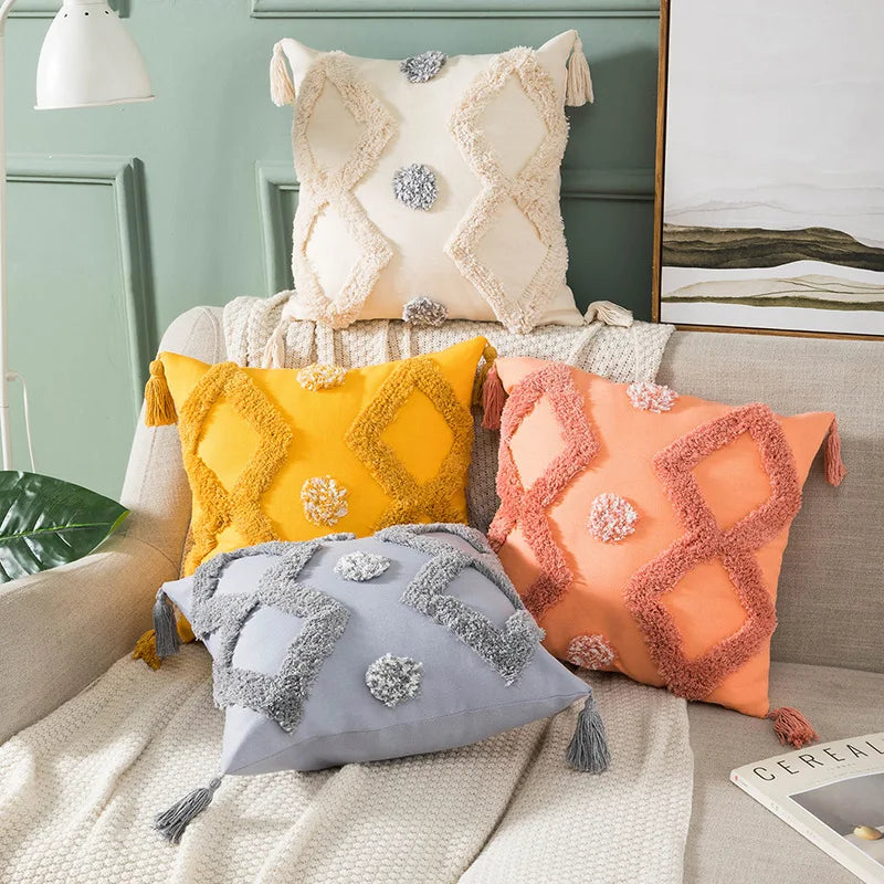 coussin brodé géométrique moderne toile coton couleur beige pompons décoratif