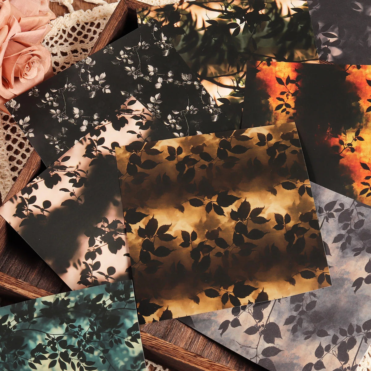 papier decoratif feuilles noires fond sombre feuilles blanches fond clair artisanal noir orange gris