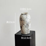 vase poterie moderne gris beige fleur séchée décoration intérieure texture marbrée lisse rustique arrangement