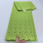 tissu dentelle coton blanc motifs floraux broderie strass robe couture luxe