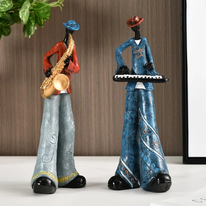 statues musiciens résine trompette saxophone chanteur clavier violoncelle ethnique artisanal décoration maison salon