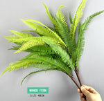 plantes artificielles feuilles fines vertes brunes modernes accrochables extérieures decoration murale naturelle