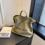 sac fourre tout toile douce lettres décontracté poche zippée beige matériau canvas casual étudiant