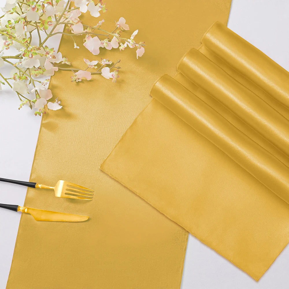 nappe satinée jaune doré blanc turquoise décoration table festive mariage événement spécial rubans décoratifs