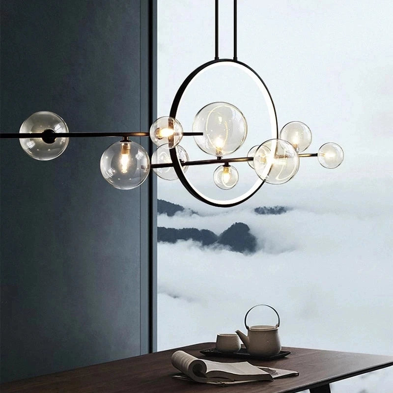 suspension lumineuse moderne noir boules transparentes scandinave chaînes suspendues interrupteur poussoir lumière salon cuisine