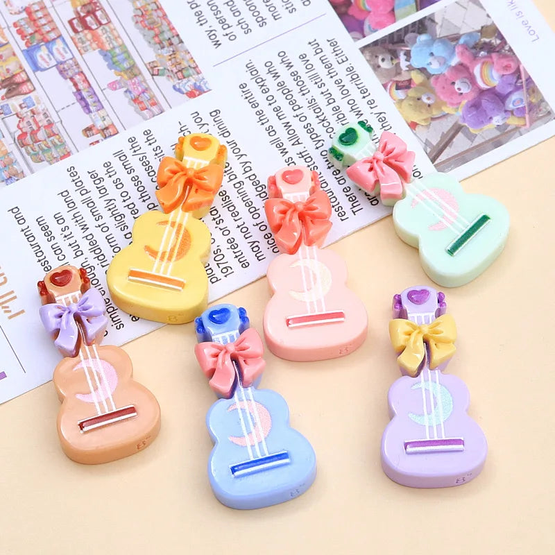 clips cheveux forme guitare motif cordes blancs arcs colorés boutons centraux mignon enfants