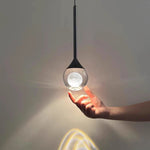 suspension lumineuse moderne noir argenté transparent serviettes peignoirs osier decoration interieur minimaliste