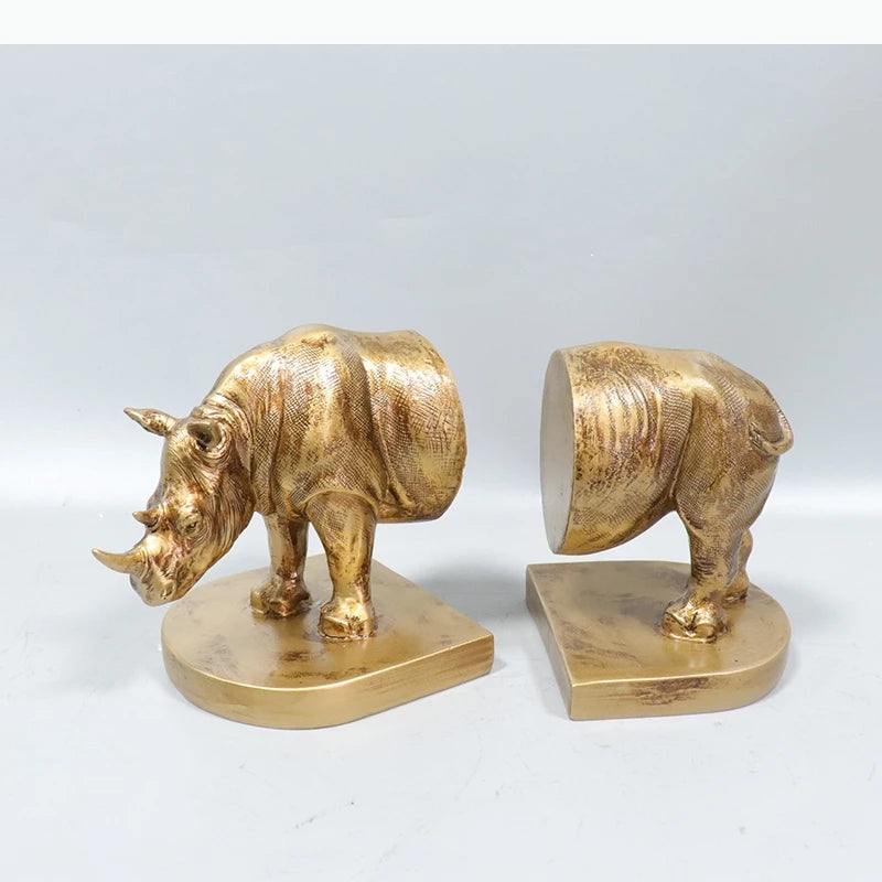 serre livres rhinocéros doré texture vieillie décoration animalier deux pièces