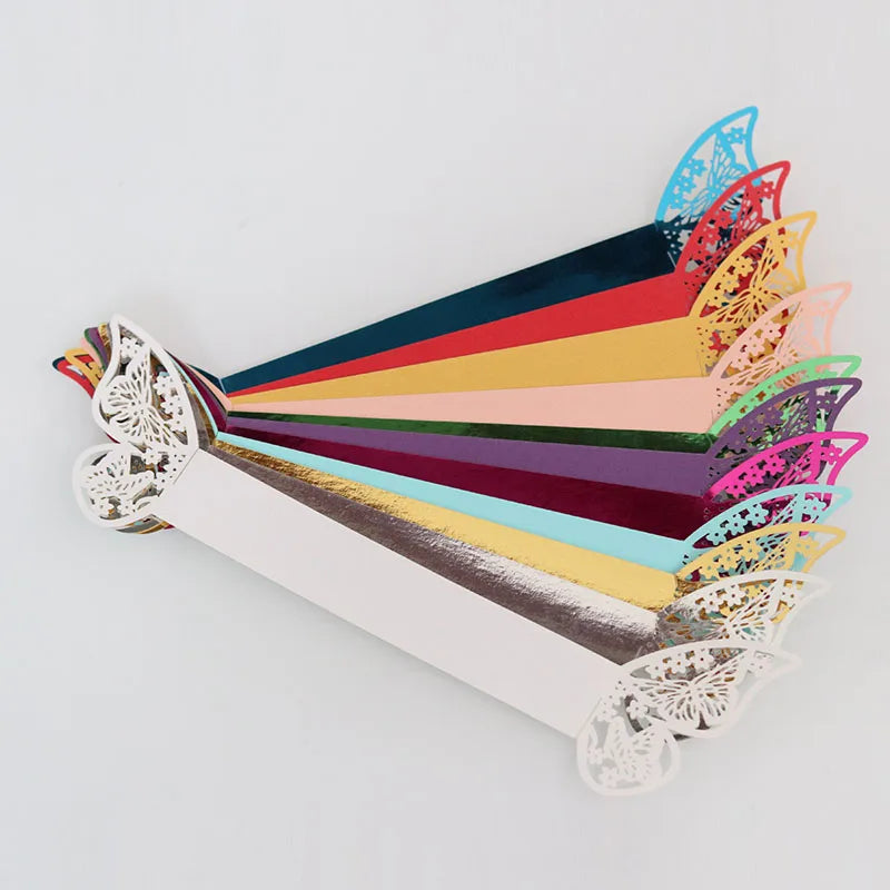 serviettes pliées papillon or multicolores adhésifs décoration table événement festive festive festive festive festive