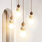 suspension lumineuse moderne pierre bois texture naturelle 3000K marron clair interrupteur bouton LED 90