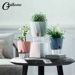 pot plantes moderne transparent semi opaque facettes géométriques blanc rose grisSuspension