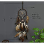 attrape rêves traditionnel plumes marron toile filet décoration chambre artisanal