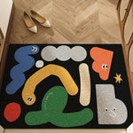 Tapis noir avec des formes colorées géométriques abstrait et des yeux dessinés.