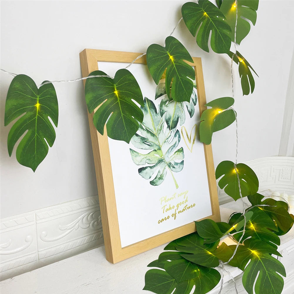 guirlande feuilles vertes led festives decoration feuille monstera lumiere jaune deco mur plantes artificielles