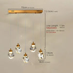 suspension lumineuse moderne transparente facettes géométriques dorées élégante autoinstallation led chambre salon