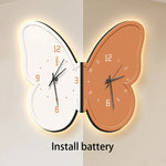 horloge murale moderne aiguille lumineuse papillon noir blanc salon résine