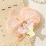 fleurs artificielles orchidées clips décoration mariage intérieur composition florale maison
