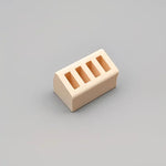 support chargeur moderne réutilisable plastique beige clair quatre fentes opaques objets divers respectueux environnement