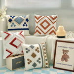 coussin brodé polyester moderne bohème motif géométrique blanc beige bleu gris marron 45x45cm