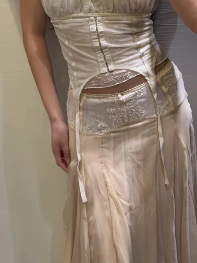jupe mi mollet plissée mousseline semi transparente broderie dentelle ceinture rubans élégante printemps été