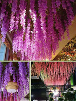 Détail des fleurs de glycine artificielles en PVC