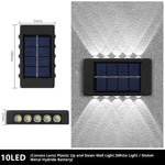 lampe murale solaire noire moderne panneau solaire blanc led extérieure jardin paysage