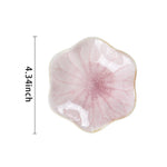 plateau bijoux céramique rose clair blanc bleu foncé motif floral moderne élégant anneaux boucles