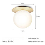 lampe moderne verre transparent noir doré élégante sphérique éclairage contemporain