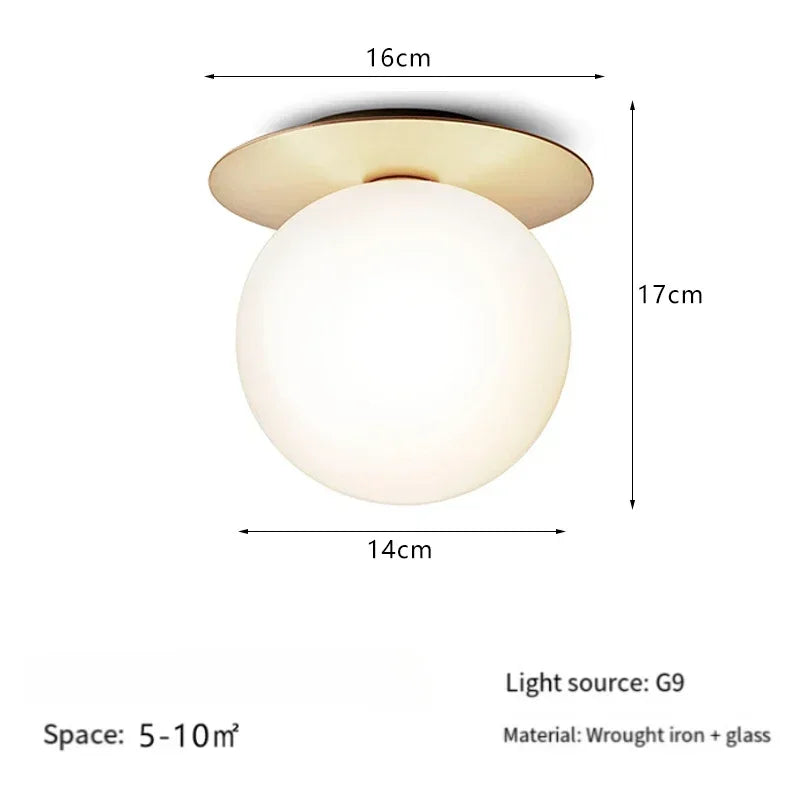 lampe moderne verre transparent noir doré élégante sphérique éclairage contemporain