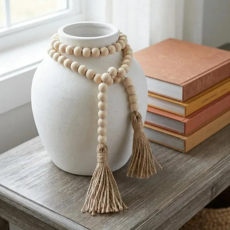 décoration murale guirlande bois boho rustique pompons beige farmhouse