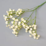 bouquet artificiel fleurs roses blanches marrons rouges petite fleurs rondes naturel minimaliste decoration maison