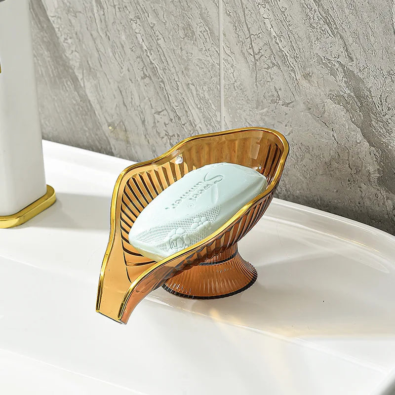 porte savon feuille transparente bord doré motif rayonné savon blanc vert orange moderne élégant