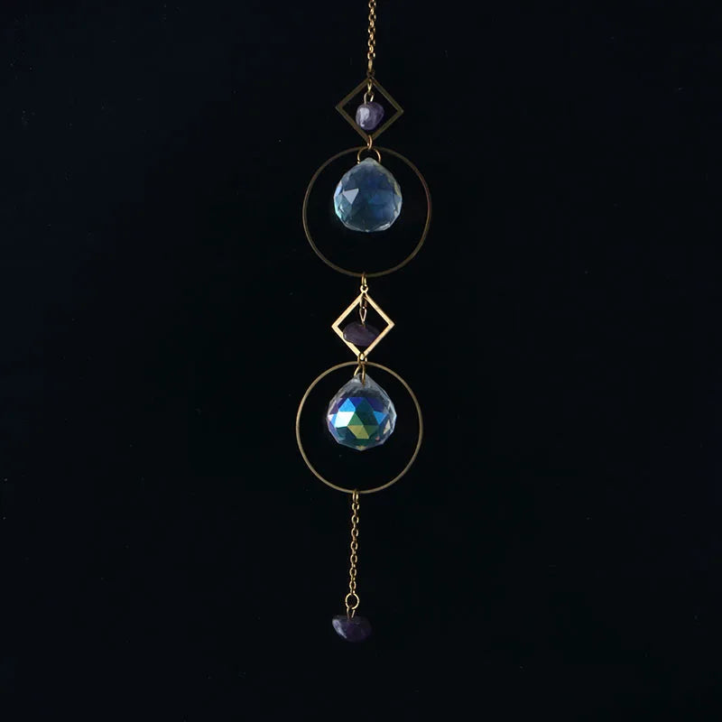 bijou pendentif cristal or bleu violet vert formes géométriques motifs oculaires translucides boho chic