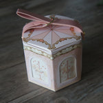 boîtes cadeau hexagonales chevaux carrousel bleu rose rouge occasion fête vintage romantique boucle métallique