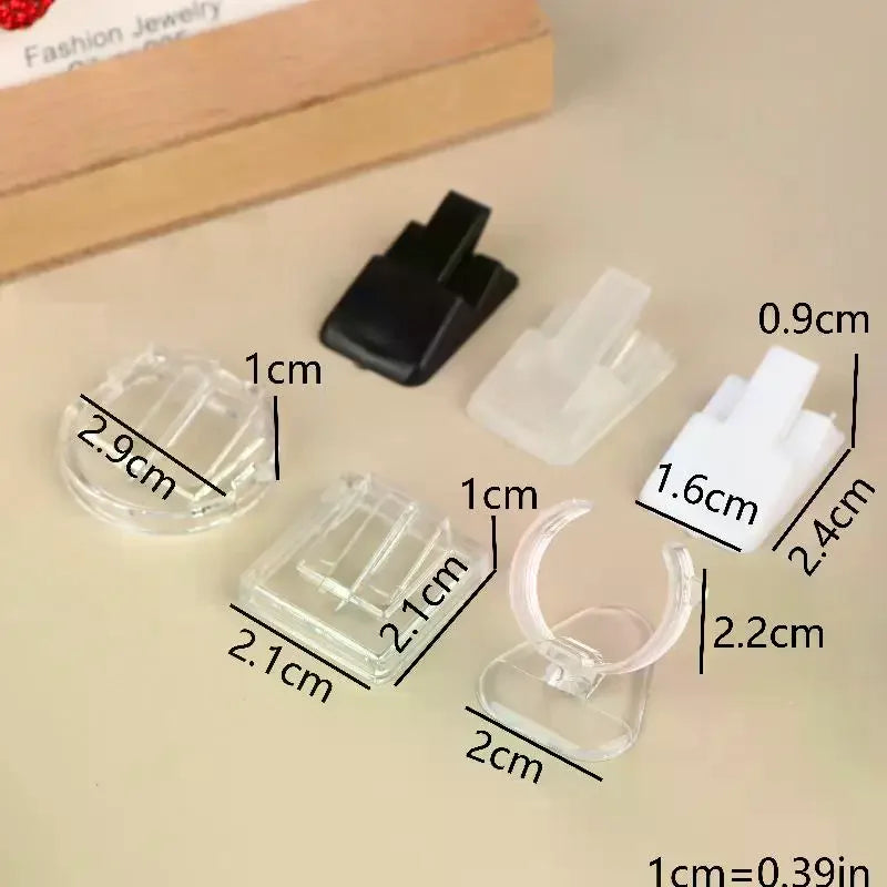 supports bijoux transparents blancs noirs clips modernes minimalistes rangement affichage bagues stockage