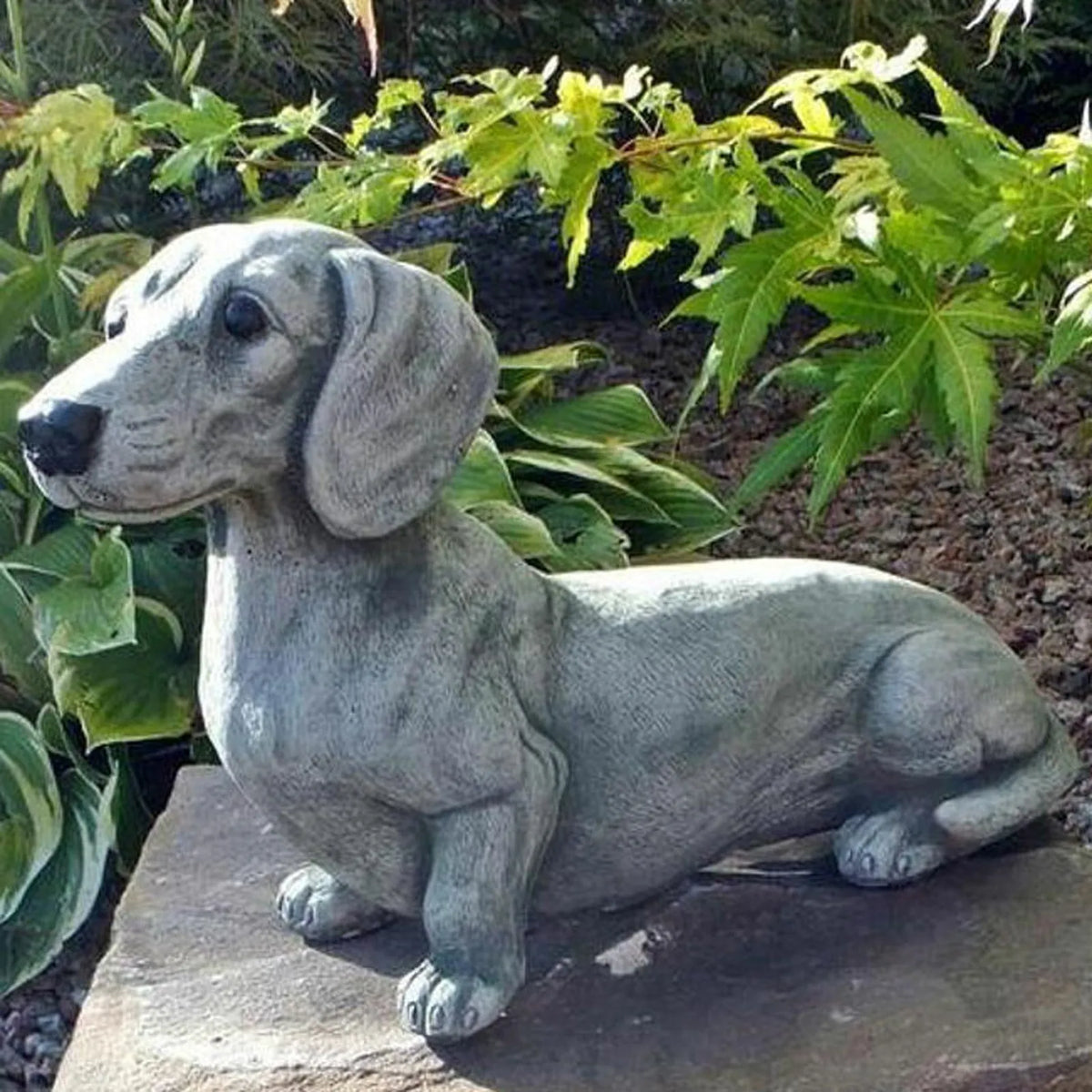 statue chien teckel pierre gris jardin décoration extérieure animaux texturé nature