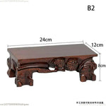 support bois sculpté motifs floraux artisanal miniature collection marron foncé