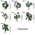 ornement décoration intérieure plante artificielle feuilles larges racines visibles vert foncé points blancs